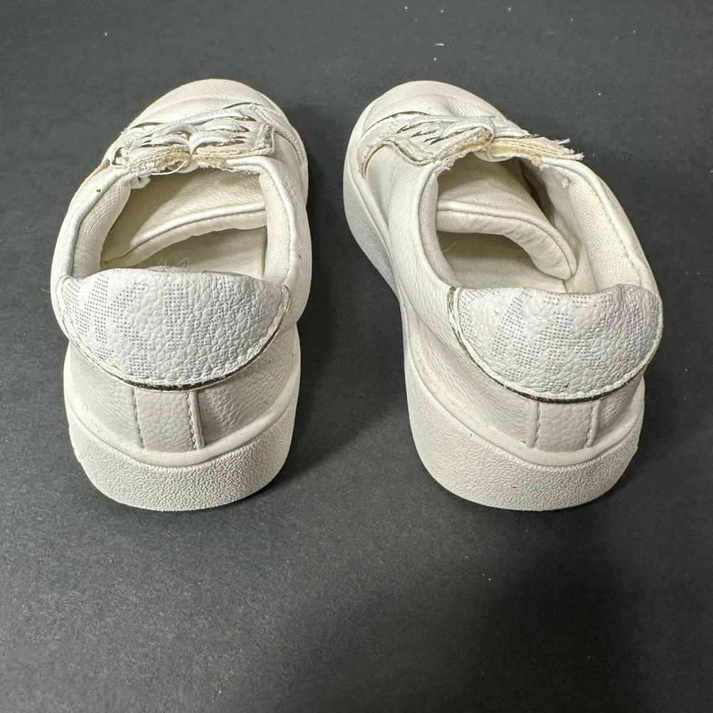 Kids White and Gold Sneakers MK size 6 pre owned good conditions